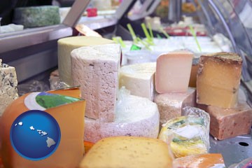 a cheese display at a dairy products store - with Hawaii icon