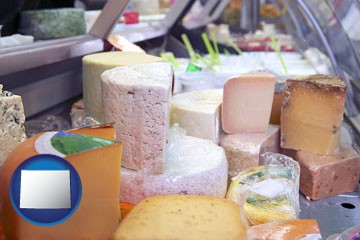 a cheese display at a dairy products store - with Wyoming icon